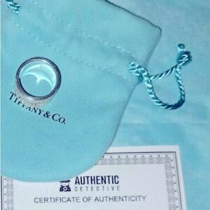 Tiffany & Co. unisex wide band atlas ring!